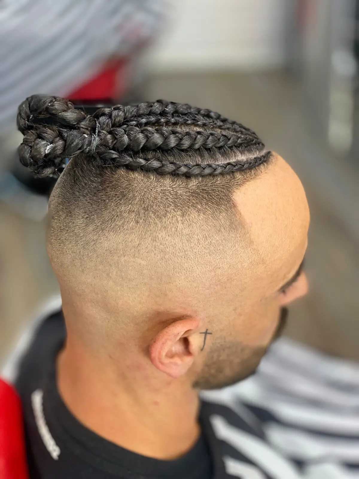 Penteado com tranças realizado na Ricky Barber Shop